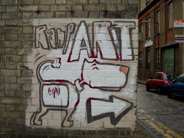 a sign indicating the direction for rampART a few meters from the social center